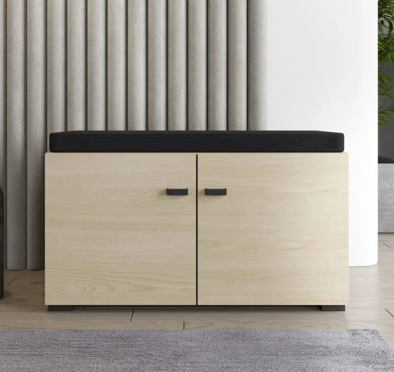 Sitzbank mit Stauraum | 2 Drehtüren | Farbe: Eiche light Port | gepolstertes Sitzkissen | 2 Fächer | Maße: 77 x 35 x 40,5 cm | Beine & Griffe: Schwarz