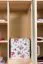 Kleiderschrank | 5 Drehtüren | 4 Schubladen | 12 Fächer | 121 cm breit | Massivholz | Farbe: Natur Abbildung