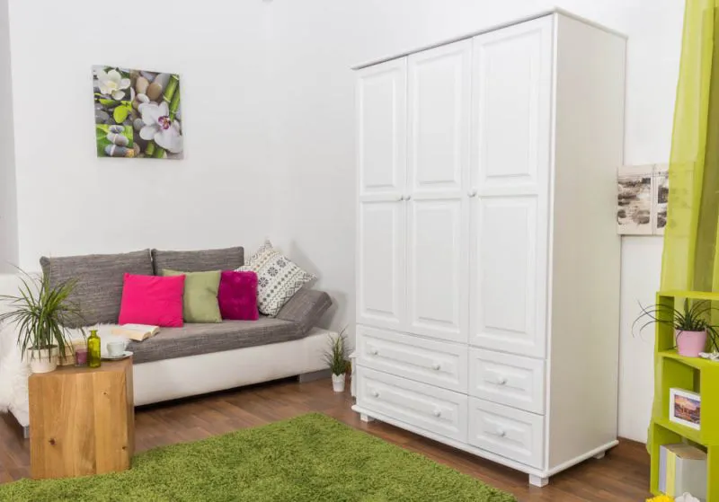Kleiderschrank | 3 Drehtüren | 4 Schubladen | 3 Fächer | mit Kleiderstange | 133 cm breit | Massivholz | Farbe: Weiß Abbildung